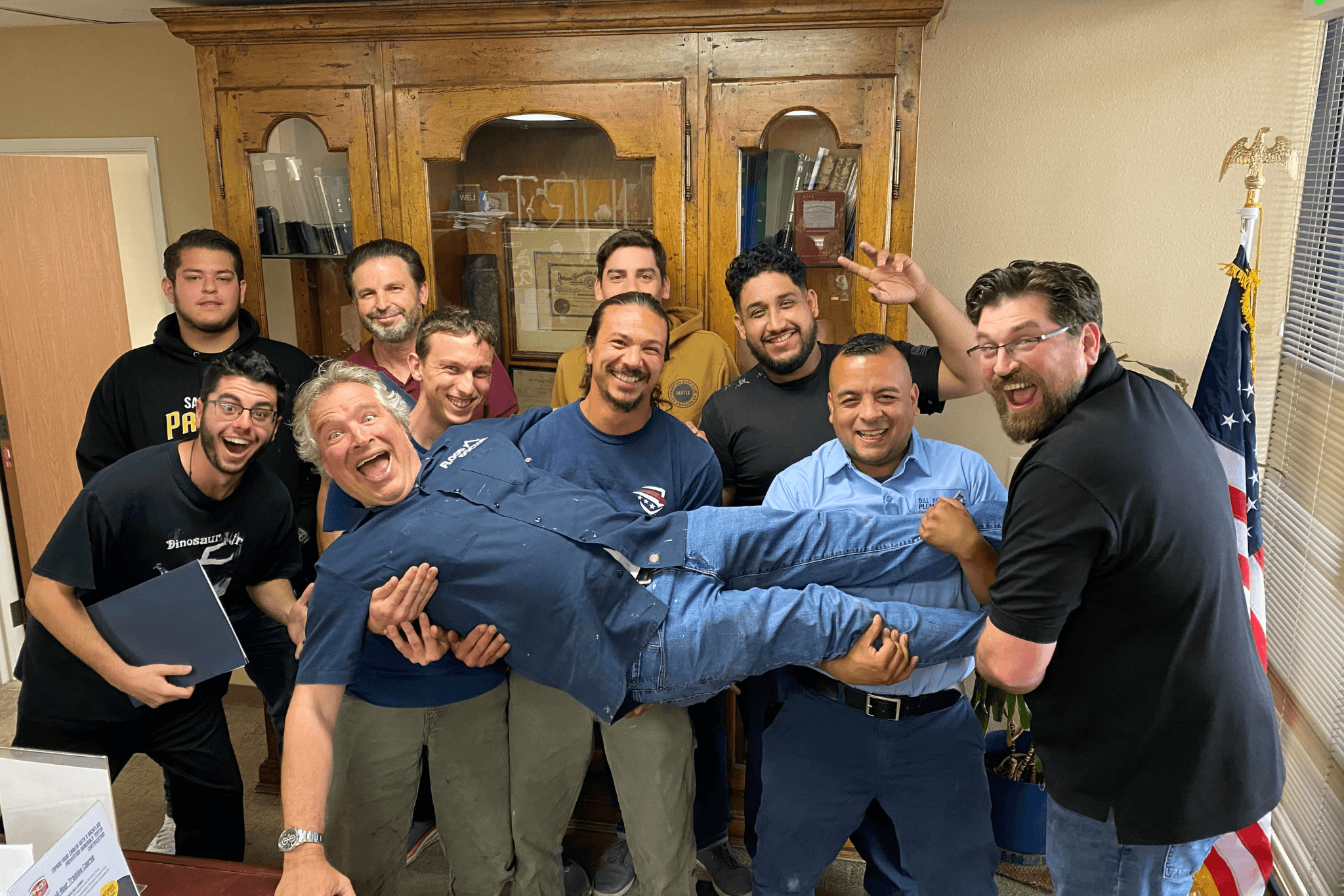 PHCC Academy instructor guiding HVAC students through hands-on training in San Diego