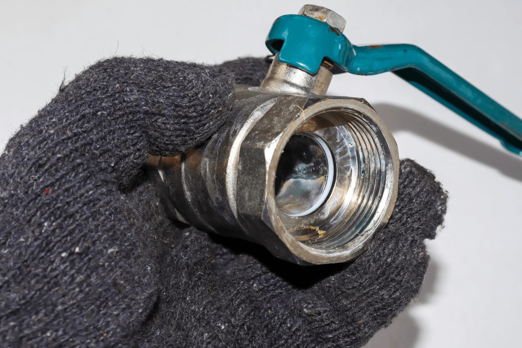 Close-up of a shutoff valve on a backflow prevention assembly used in San Diego water systems
