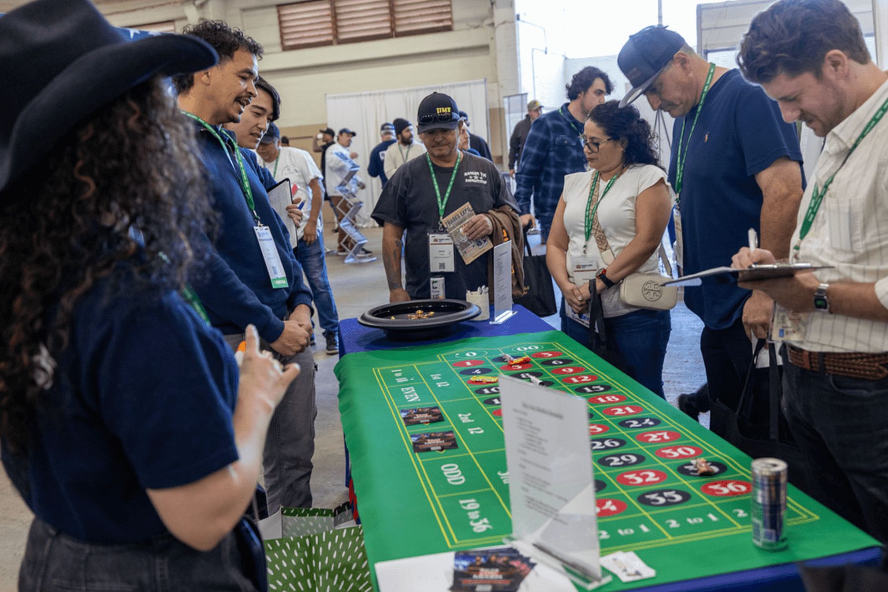 Attendees taking part in an interactive exhibitor activity at the Trades Expo