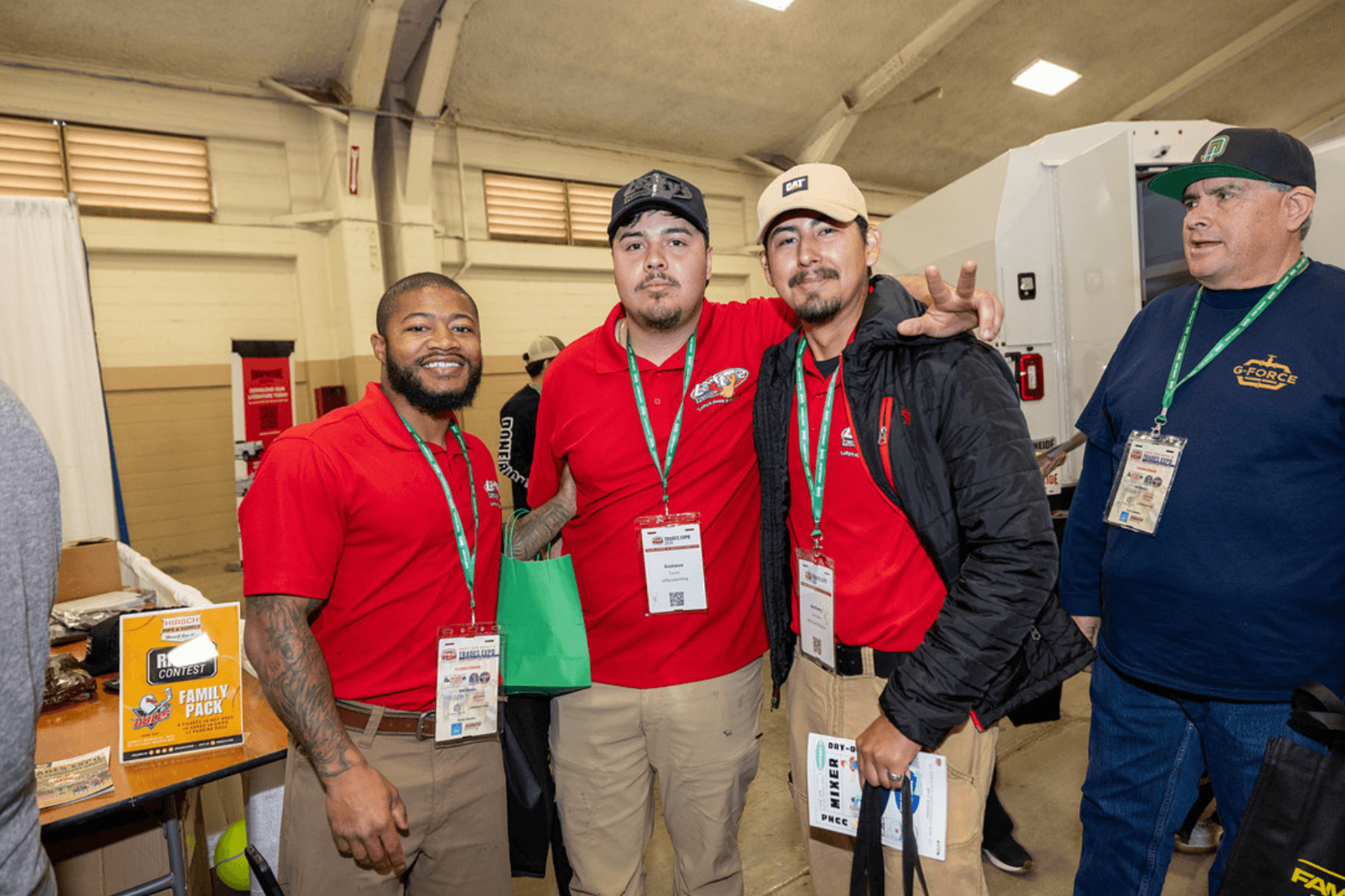 Plumbing apprentices networking as attendees at the Trades Expo