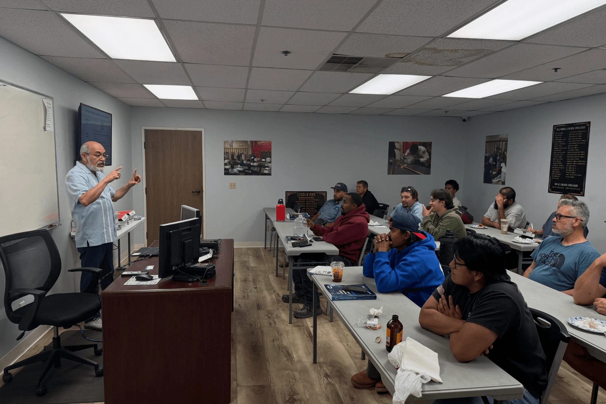 Backflow certification students in a classroom training session at PHCC Academy of San Diego