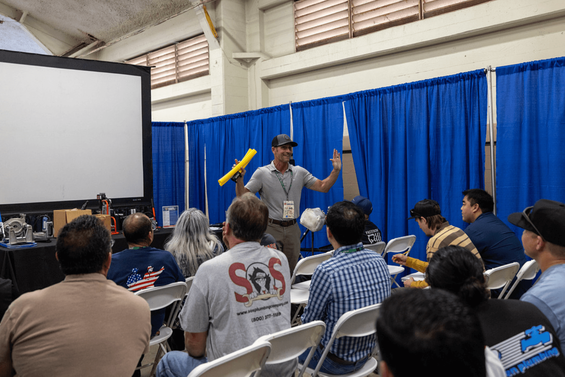 Attendees seated in a PHCC training session at the Trades Expo